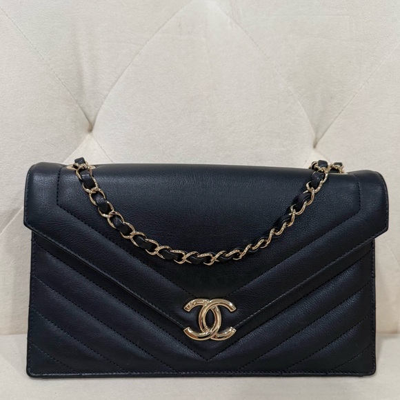 CHANEL Handbags - Chanel Black Chevron Leather Envelope Bag GHW
